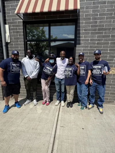 Campaign canvassers standing together before heading into the field